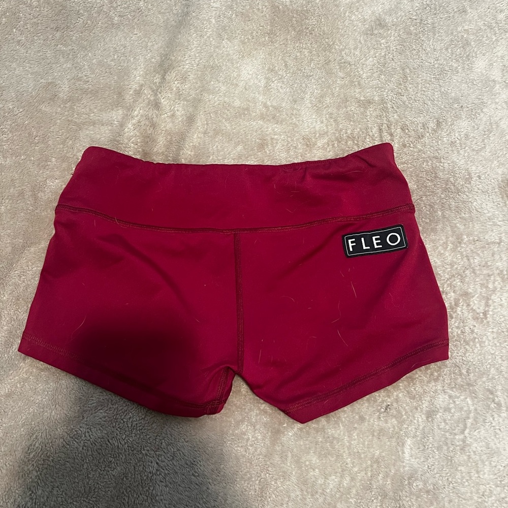 Medium fleo burgundy low waisted shorts .